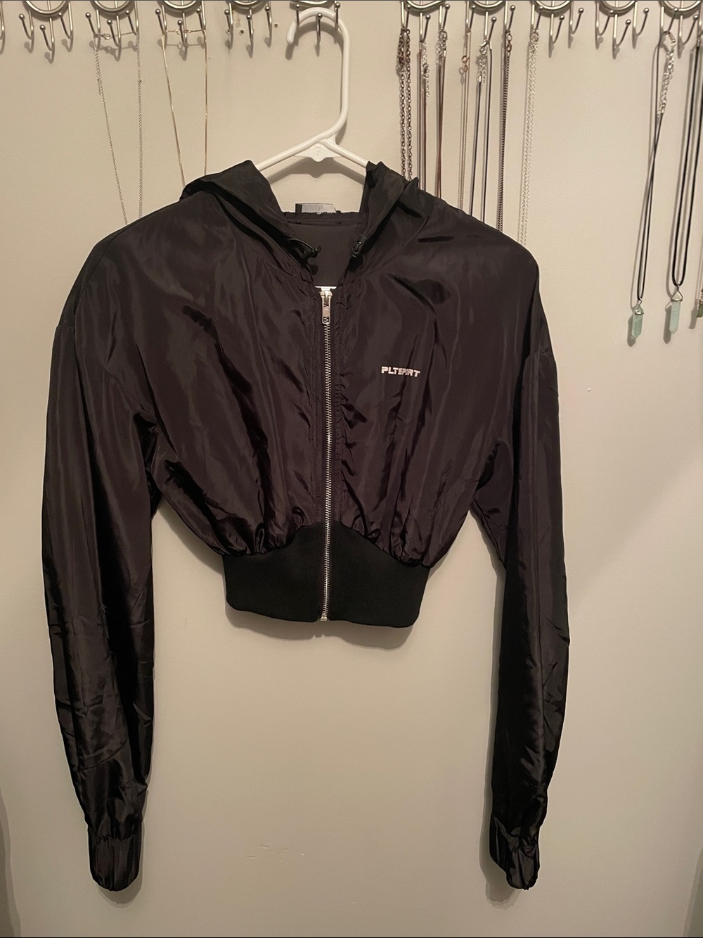 PrettyLittleThing Black Cropped Windbreaker jacket